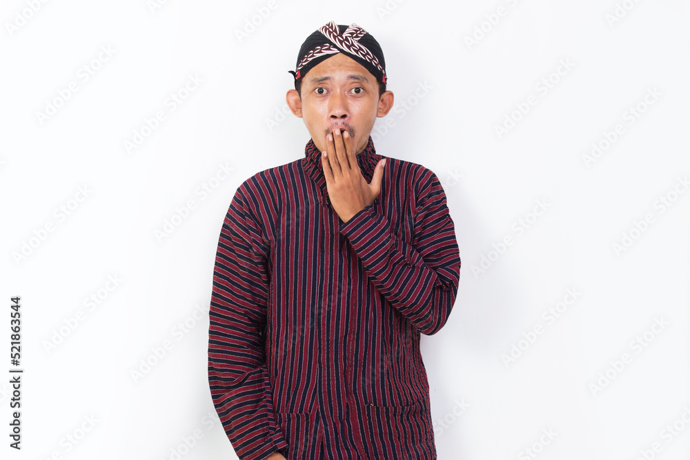 asian man with javanese traditional cloth lurik shocked isolated on white background asian man with javanese traditional cloth lurik shocked isolated on white background