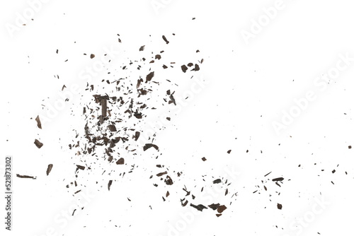 Explosion effect, burned, charred paper scraps, scattered isolated on white texture, top view © dule964