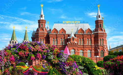 Flowers on Manezhnaya Square, Moscow, Russia. Historical Museum (it's written on roof) in background