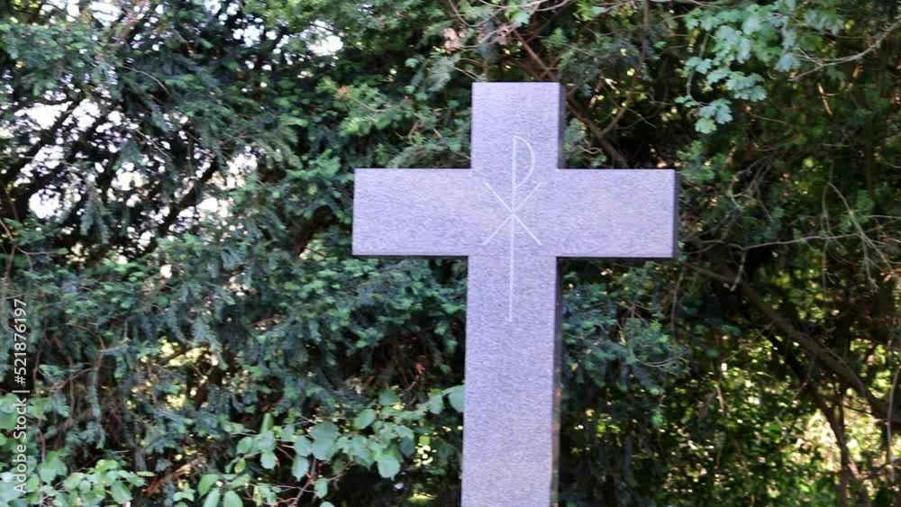 Holy cross on grave as religious symbol for death faith belief christianity jesus christ and god on old cemetery for memorial to dead family members buried in a tomb on their way to heaven and god Holy cross on grave as religious symbol for death faith belief christianity jesus christ and god on old cemetery for memorial to dead family members buried in a tomb on their way to heaven and god