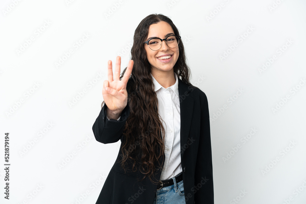 Young business woman isolated on white background happy and counting three with fingers Young business woman isolated on white background happy and counting three with fingers