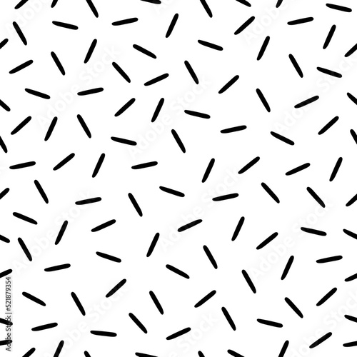 Memphis style chaseamless pattern. Chaotic short lines irregular vector texture on white background.