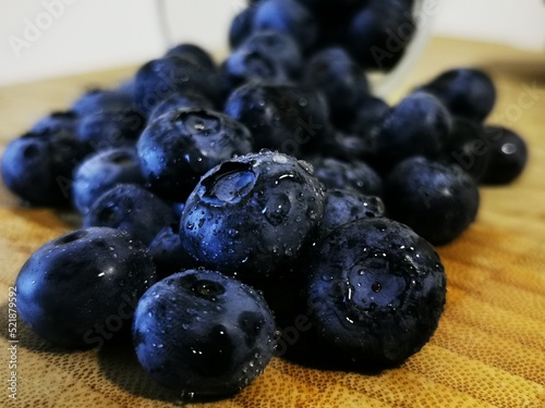 Fresh Blueberry fruits. Drops of water on organic blueberry
