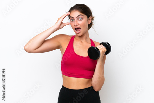 Young sport caucasian woman making weightlifting isolated on white background with surprise expression
