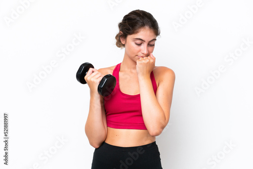 Young sport caucasian woman making weightlifting isolated on white background having doubts