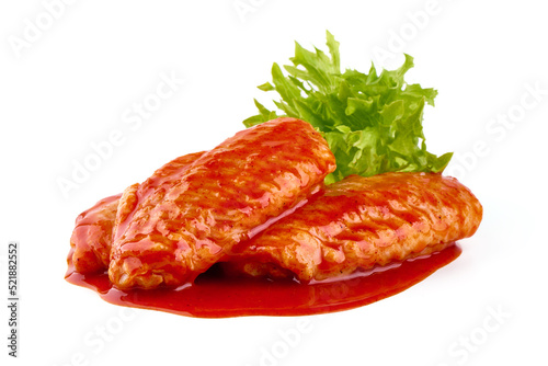 BBQ Chicken Wings with lettuce salad leaf, isolated on white background.