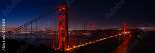 Large panorama of blue hour of the Golden Gate Bridge and cityscape in the early morning from Marin headlands
