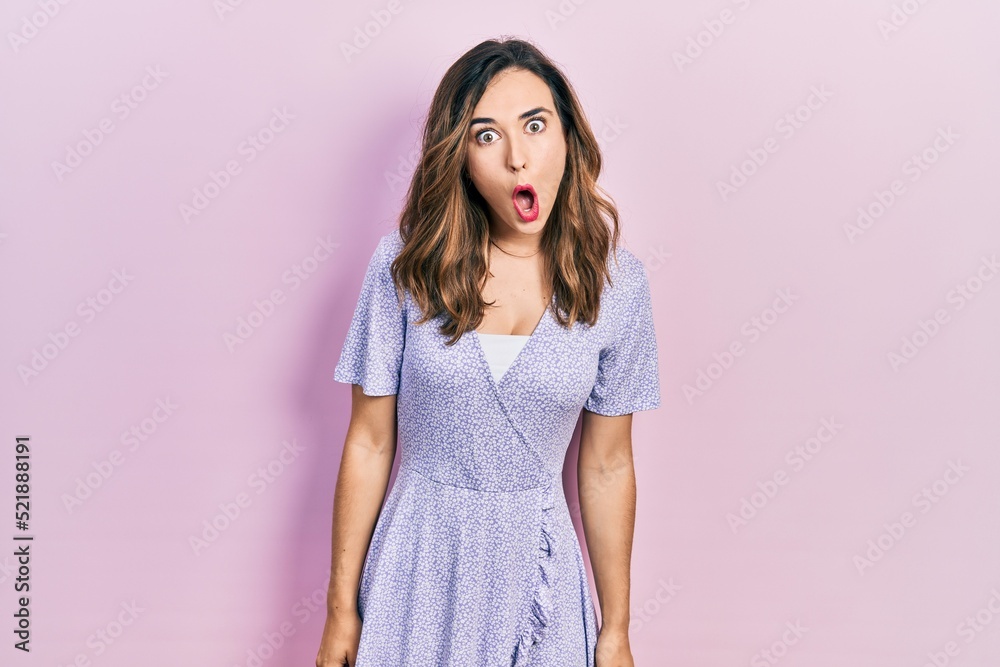 Young hispanic girl wearing casual clothes afraid and shocked with surprise expression, fear and excited face. Young hispanic girl wearing casual clothes afraid and shocked with surprise expression, fear and excited face.