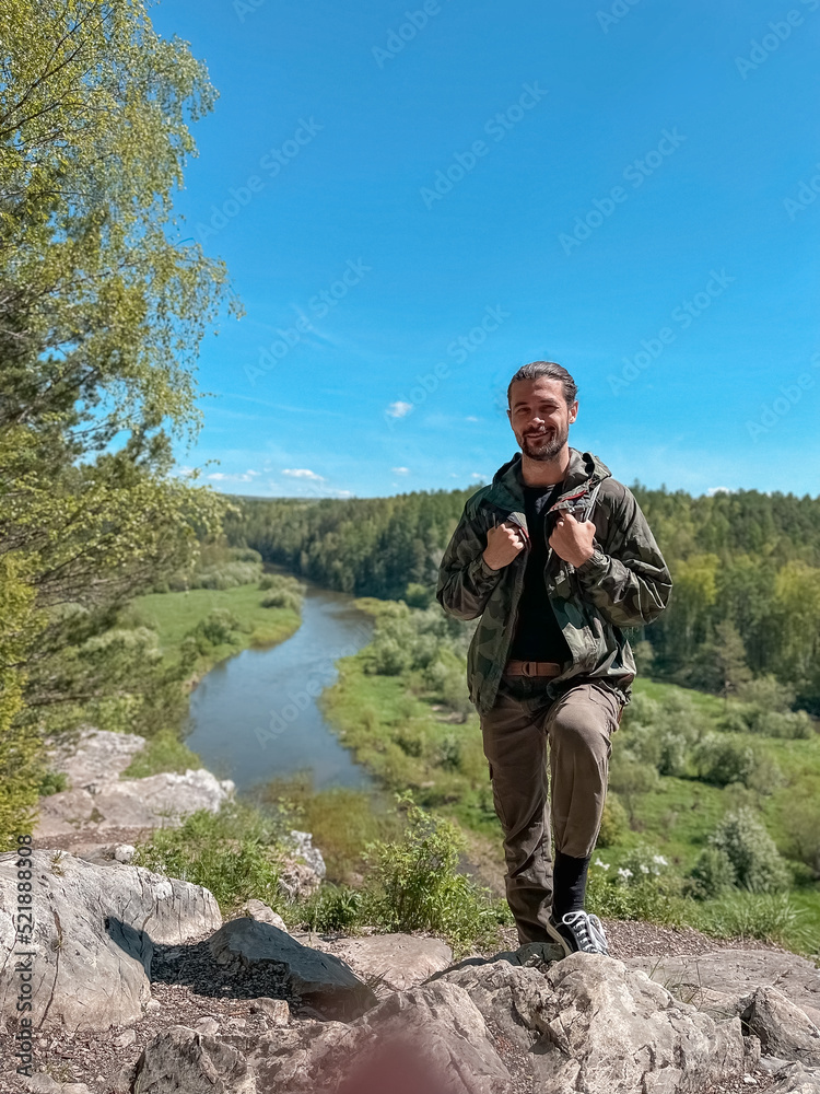Human and nature. Man walking in the mountains Human and nature. Man walking in the mountains