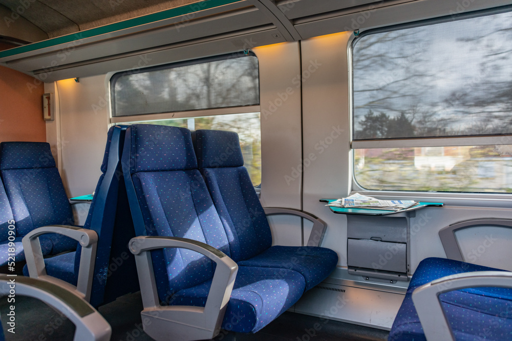 interior of a train with seats interior of a train with seats