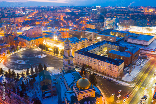 Aerial view of snow covered Lipetsk cityscape with central Cathedral square and Nativity of Christ Church in winter twilight, Russia © JackF