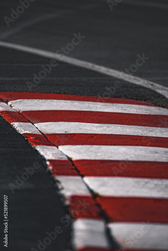 Принти на полотні red and white kerb on formula one racetrack
