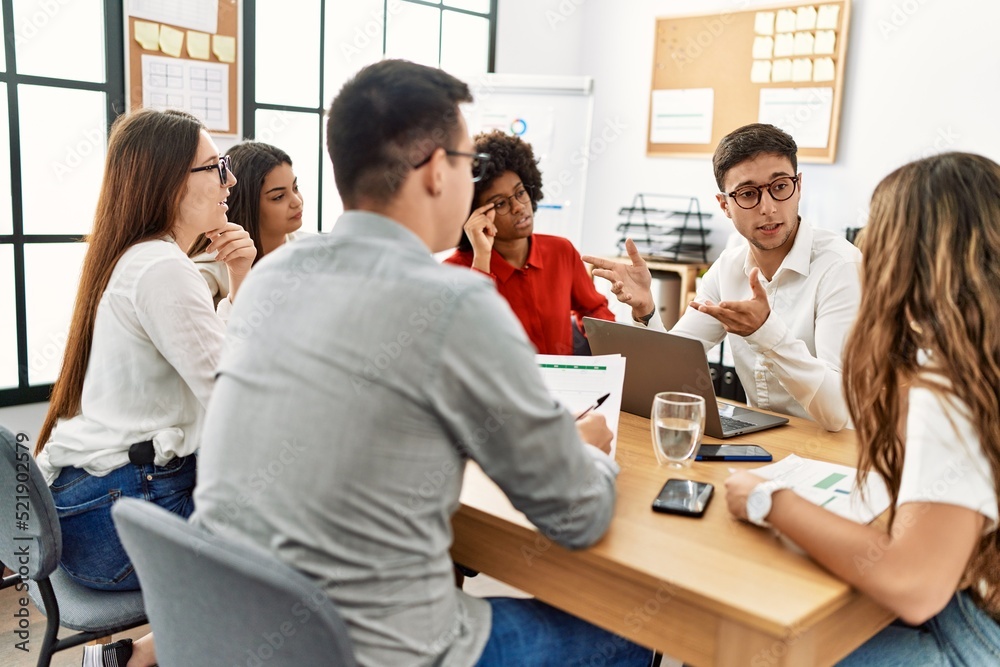 Group of business workers concentrate working at the office.