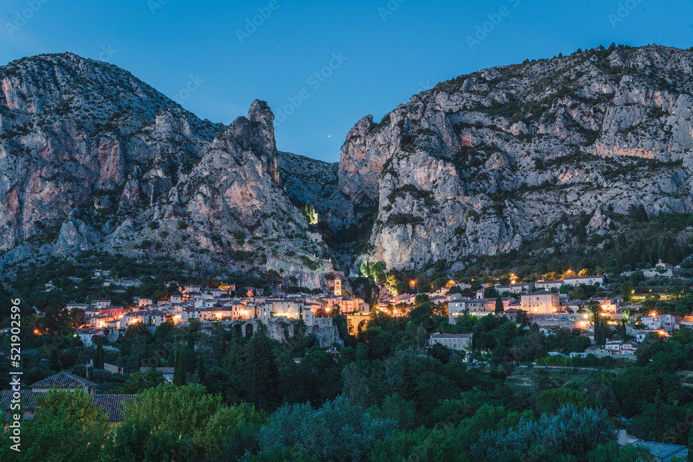 Moustiers-Sainte-Marie at night, a French town in Provence, France