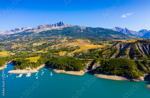 Panoramic scenic view of Serre-Poncon Lake and Alps in southeast France