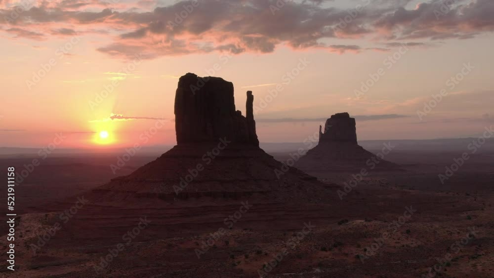Monument Valley East and West Mitten Buttes Sunrise Aerial Shot Forward Navajo Nation Southwest Desert Arizona Utah USA Monument Valley East and West Mitten Buttes Sunrise Aerial Shot Forward Navajo Nation Southwest Desert Arizona Utah USA