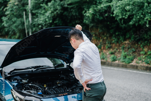 Asian businessman broken car engine breakdown, Accident emergency on the road concept.
