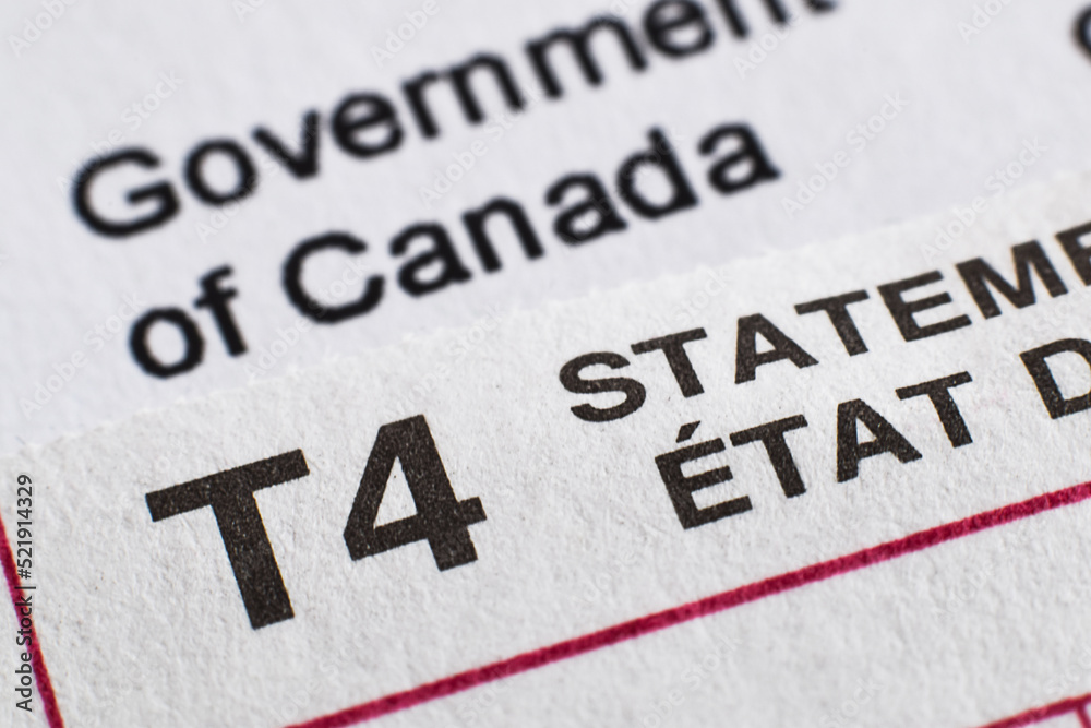 Closeup T4 Government of Canada statement for income tax filing Closeup T4 Government of Canada statement for income tax filing