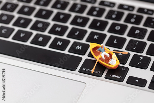 Photography Miniature creative rowing and swimming on the keyboard