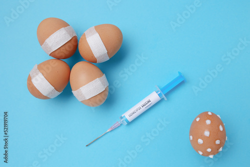 vaccinated eggs and egg with monkeypox symptoms photo