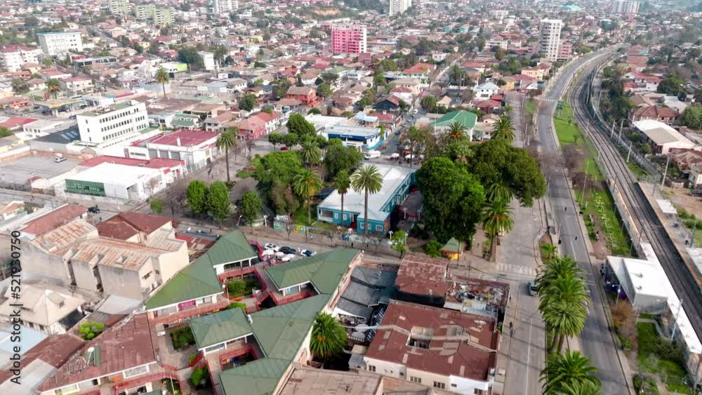 Drone flying over the Quilpue municipality at day time. Aerial view of chilean neighbourhood and buildings Drone flying over the Quilpue municipality at day time. Aerial view of chilean neighbourhood and buildings