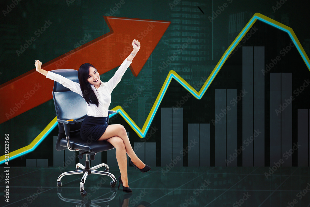 Fototapeta premium Happy businesswoman sitting with growth chart