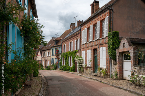One of most beautiful french villages  Gerberoy - small historical village with half-timbered houses and colorful roses flowers  France