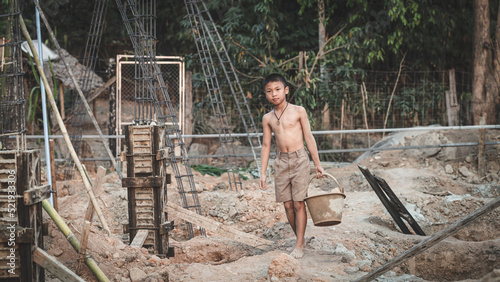 Poor children are forced to work construction  Violence children and trafficking concept Anti-child labor  Rights Day on December 10.