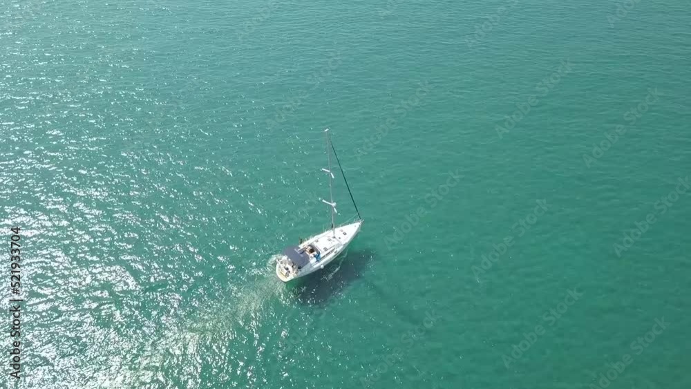 Aerial Shot Of Small Boat Sailing Into Open Blue Ocean Towards His Destination, Cyprus Aerial Shot Of Small Boat Sailing Into Open Blue Ocean Towards His Destination, Cyprus