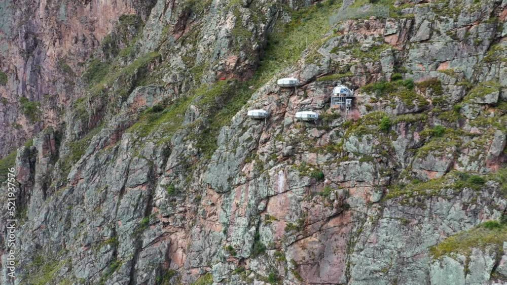 Drone shots of climbers at the Urubamba cliffs in Cusco, Peru. It is also known as the Sacred Valley. Climbers are climbing the mountain to their Airbnb. Shots are in Full HD Drone shots of climbers at the Urubamba cliffs in Cusco, Peru. It is also known as the Sacred Valley. Climbers are climbing the mountain to their Airbnb. Shots are in Full HD