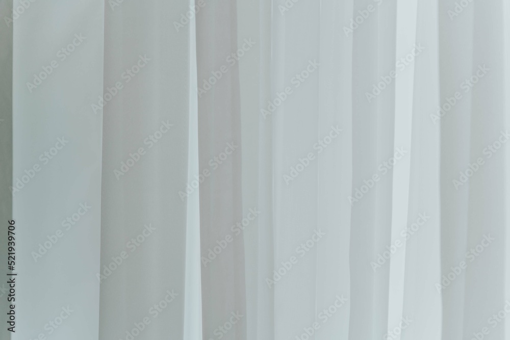 Obraz premium texture of white tulle curtains on the window background