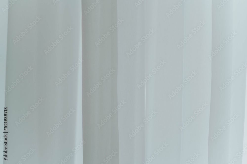 texture of white tulle curtains on the window background