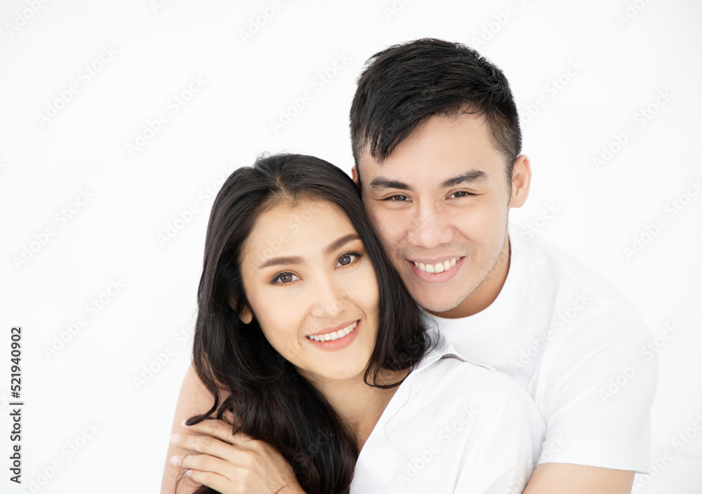Happy young couple enjoying morning in the bedroom.. Happy young couple enjoying morning in the bedroom..