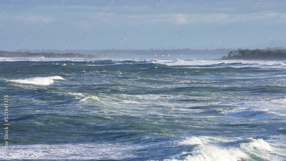 Slow Motion 4K Blue Ocean Waves Crashing At Sea With Headland On The Horizon, Australia Slow Motion 4K Blue Ocean Waves Crashing At Sea With Headland On The Horizon, Australia