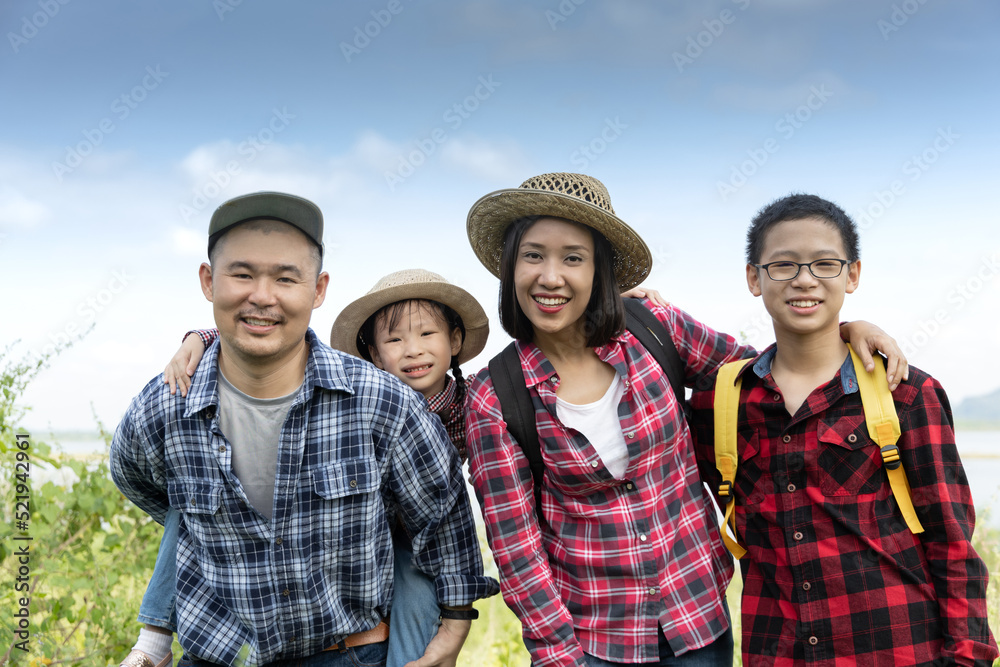 Asian family enjoy on a trekking day in the national park