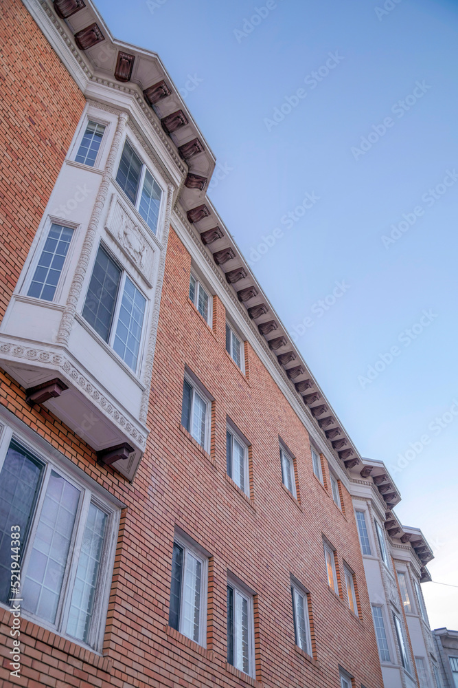Residential building in San Francisco, California with bricks and brown corbel brackets