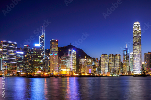 Hong Kong financial district city skyline across Victoria Harbor at night
