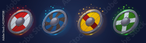 Medieval round shields icons for game design. Vector cartoon set of ancient circle wooden shields with steel frame for viking, knight and warrior armor isolated on background