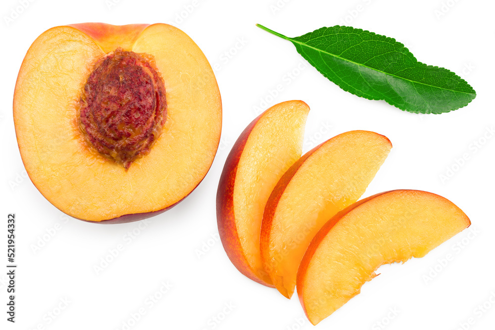 sliced peach fruit with green leaf isolated on white background. clipping path