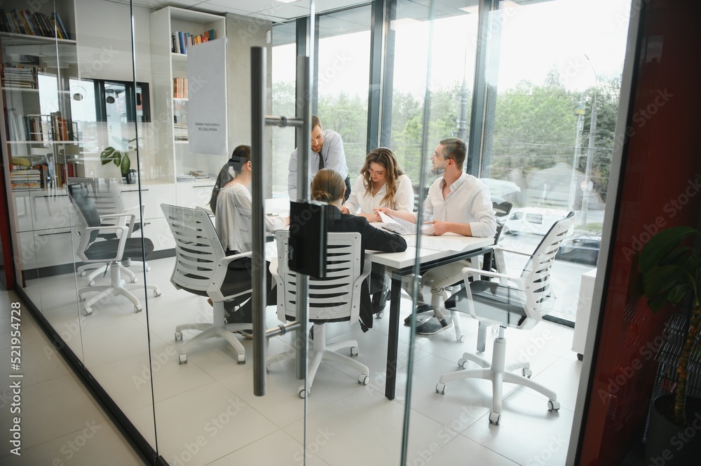 Business people working on project in office