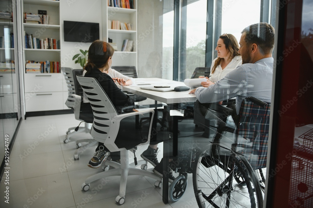 A group of business people partners during a set team meeting in the modern office. Teamwork concept A group of business people partners during a set team meeting in the modern office. Teamwork concept