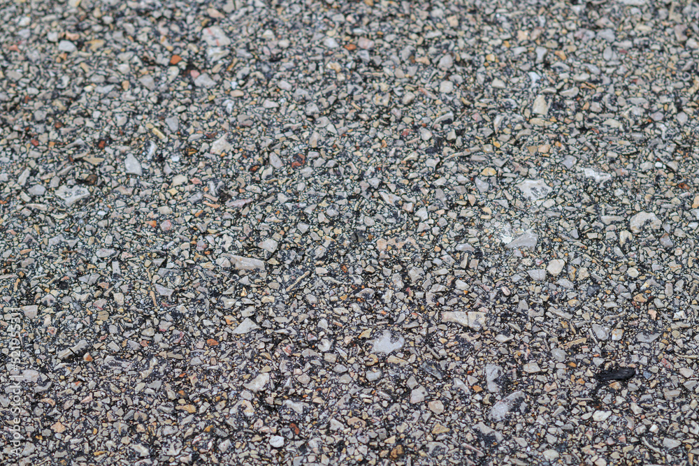 Blurred gray background of the walkway in Top View, which is paved with many small stones and copy space for inserting text for designs and advertisements. Blurred gray background of the walkway in Top View, which is paved with many small stones and copy space for inserting text for designs and advertisements.