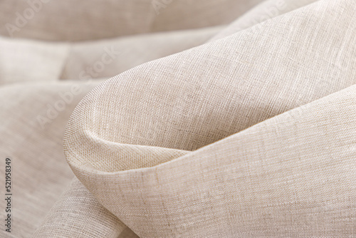 Close-up of linen fabric in light brown colour