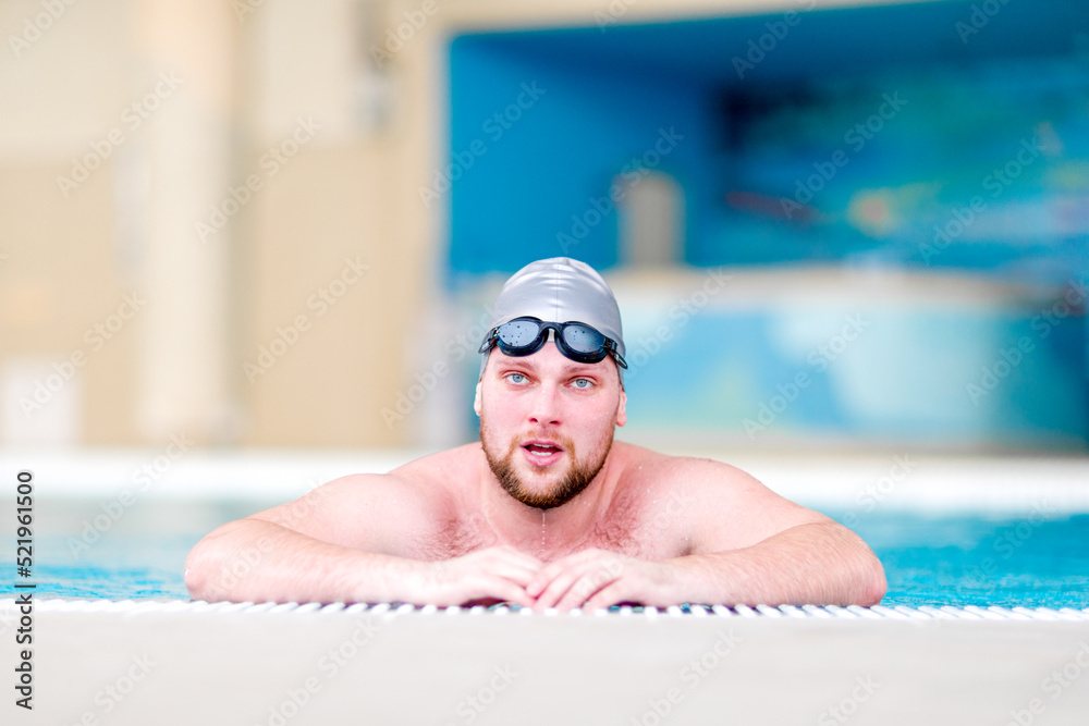 Fat man in the swimming pool.  Sports exercises