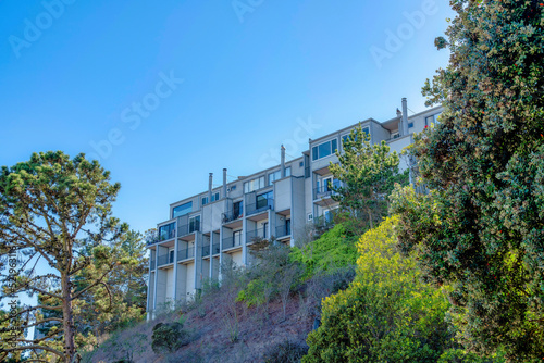 Large apartment building on top of a slope in San Francisco, California