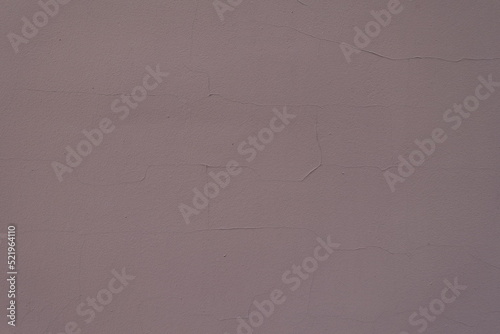 Background - dark pinkish brown painted wall with cracks photo