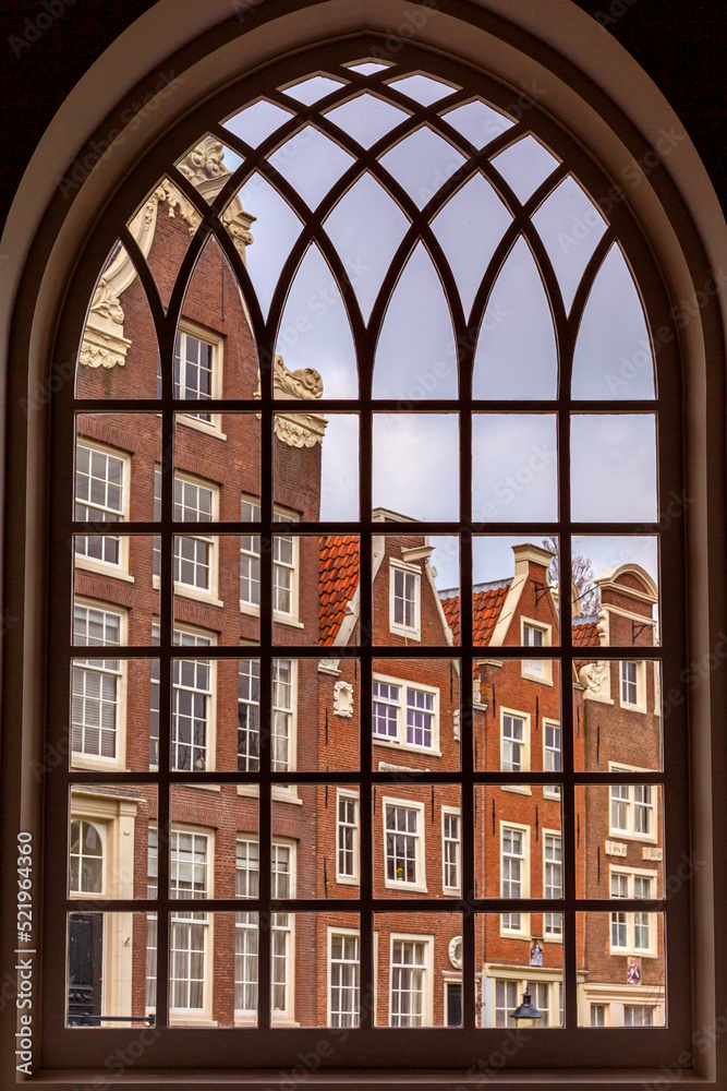 View through the window of the Begijnhof in Amsterdam, The Netherlands