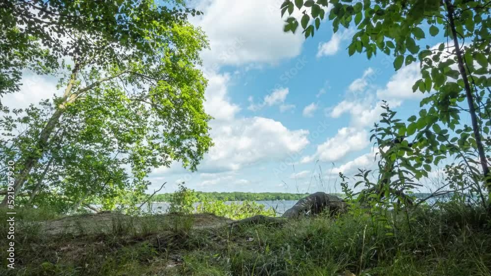 Timelapse of beautiful blue lake with an overcast sky Timelapse of beautiful blue lake with an overcast sky