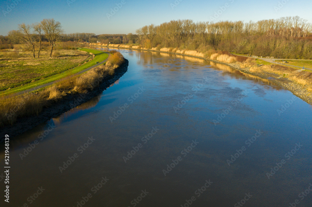 Aerial view of the Scheldt river, in Wichelen, Belgium