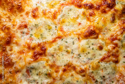 Crispy pizza topping with cheese, mozzarella and tomato sauce 